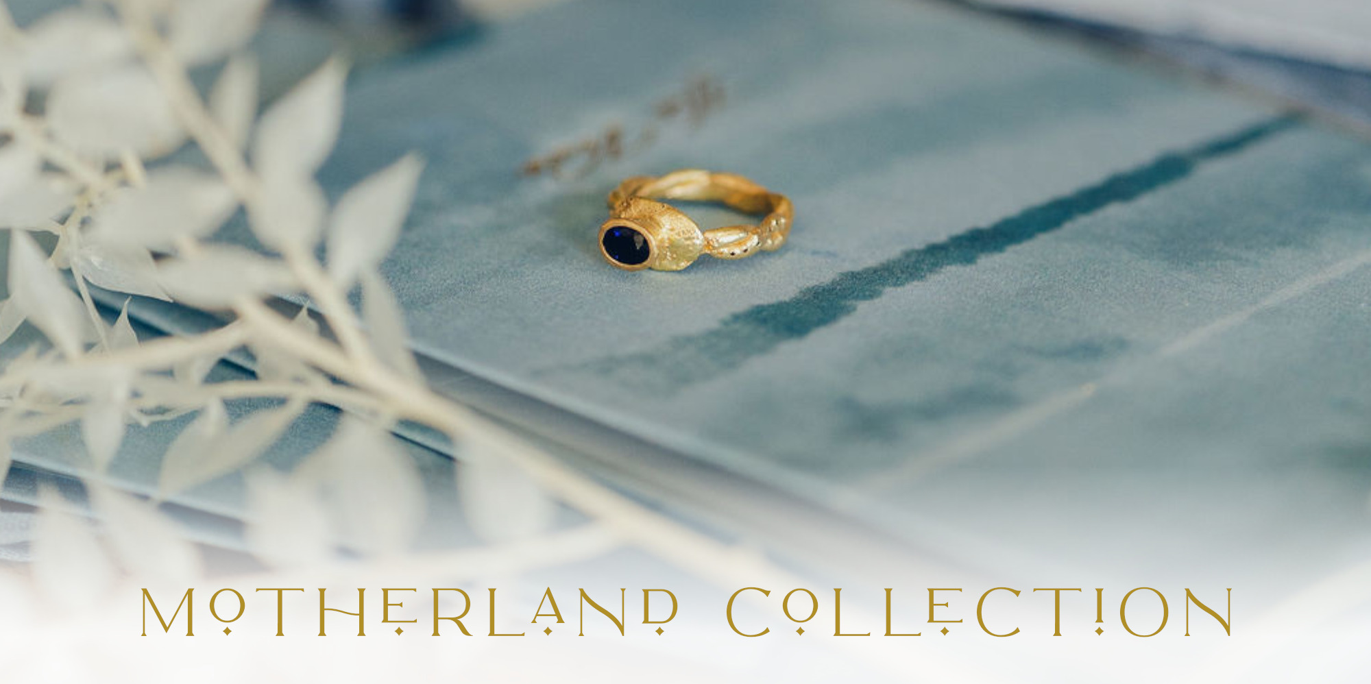 18ct gold and sapphire rustic engagement ring